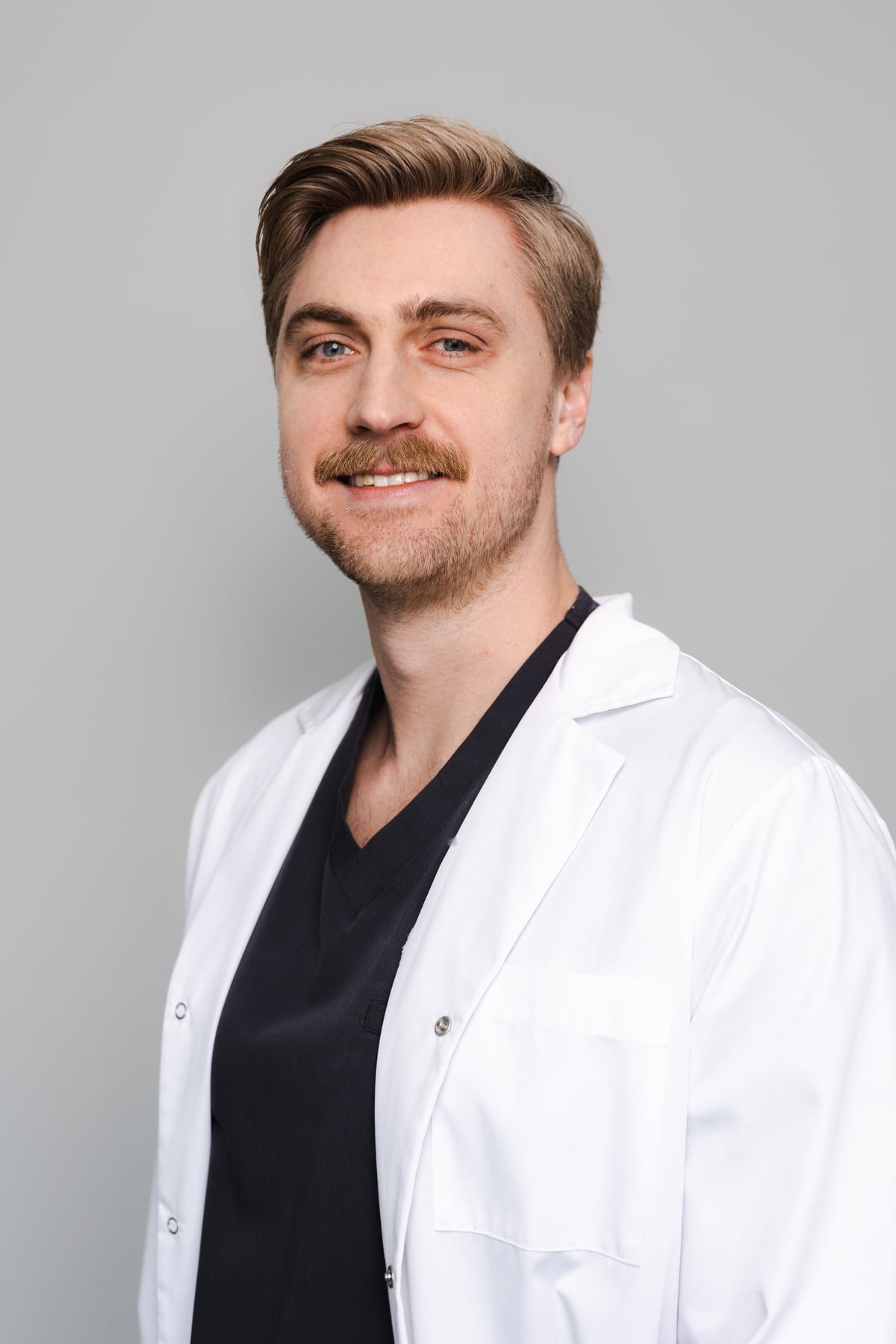 Portret dr. n. med. Adama Kurpika